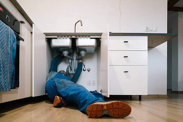 Professional Emergency Plumber technician working in Dover, MN